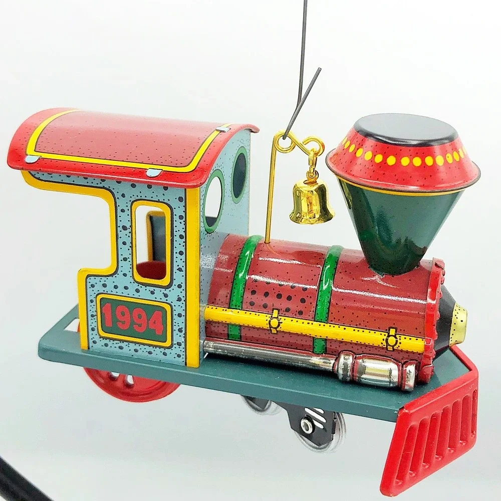 Yuletide Central #1 in ser Hallmark Ornament Tin Train 1994
